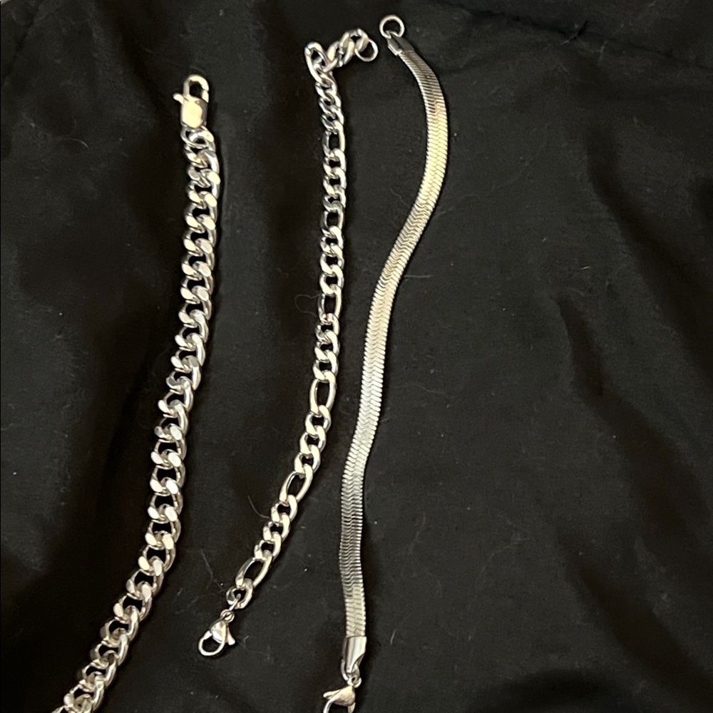 Set of 3 sterling silver bracelets.